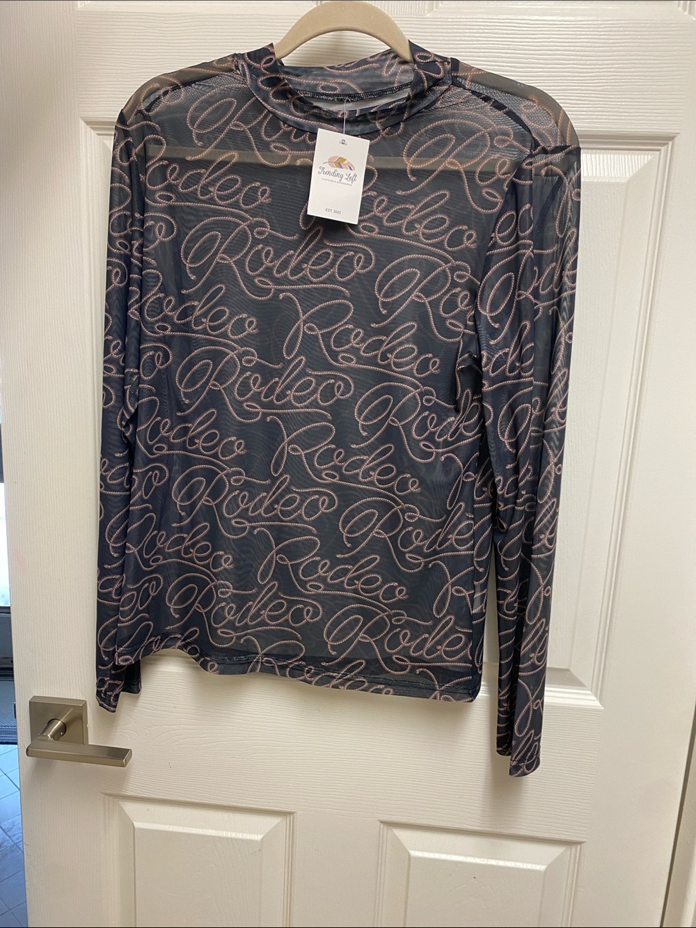 Long Rodeo Sleeve Script-Print Top in Brown and beige rope. Sizeg